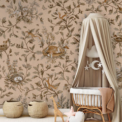 Playful Woods – Vintage Beige wallpaper mural in a nursery rattan cot canopy