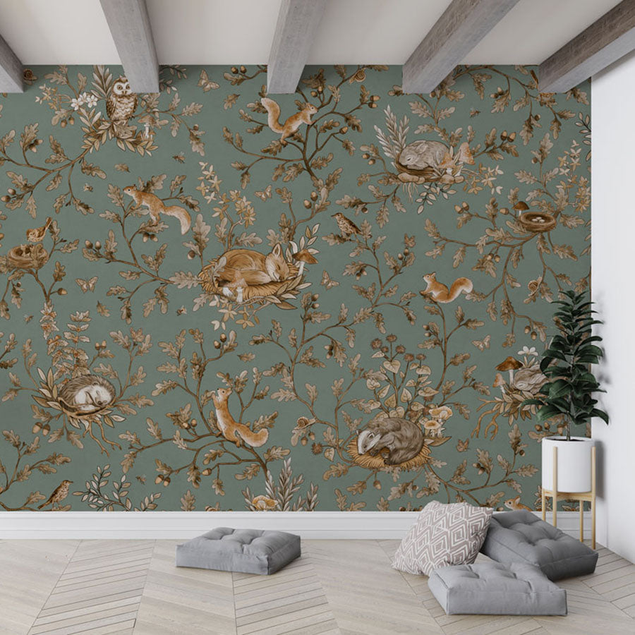 Playful Woods – Vintage Green wallpaper mural in a hanging chair floor cushions