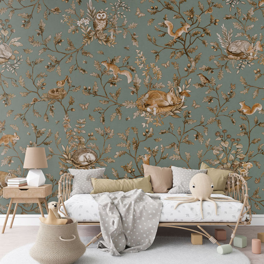 Playful Woods – Vintage Green wallpaper mural in a rattan daybed