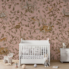 Playful Woods – Vintage Pink wallpaper mural in a nursery crib