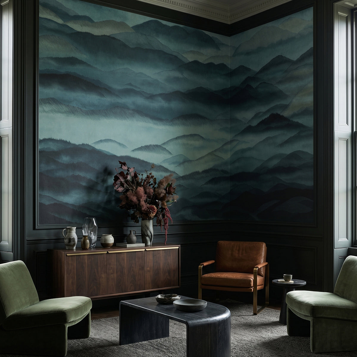 Roerich Hills wallpaper mural shown in living room with green armchairs