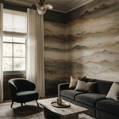 Roerich Twilight wallpaper mural shown in living room with dark sofa and green chair