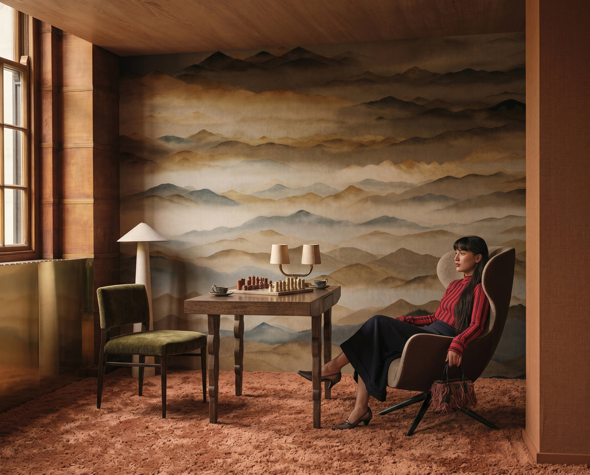 Roerich Twilight wallpaper mural shown in reading corner with table and red chair and portrait