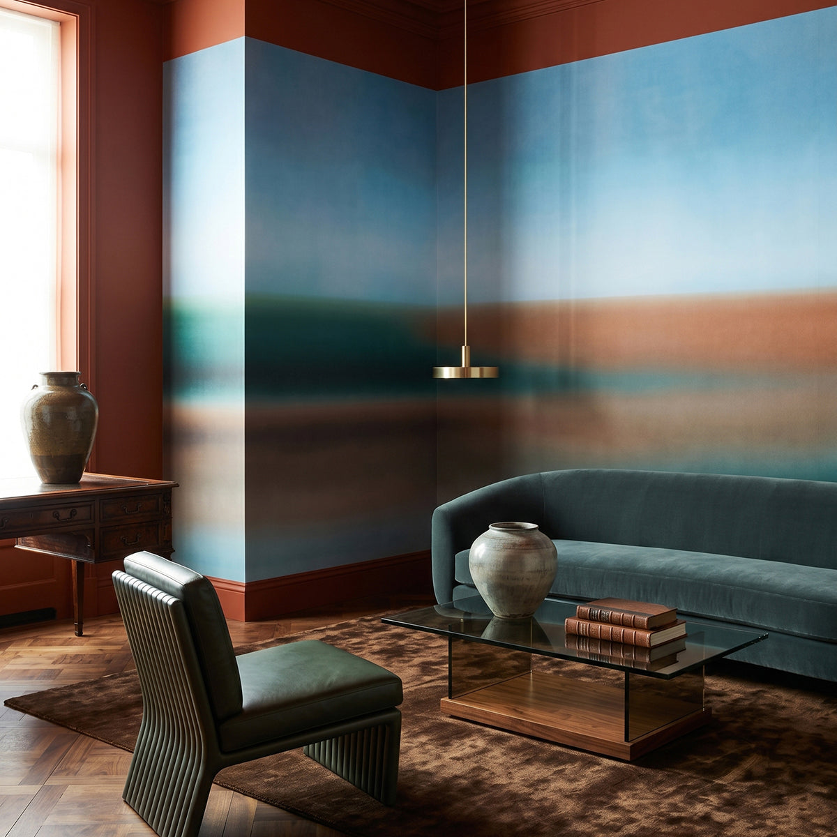 Rotko Clay wallpaper mural shown in living room with brown sofa and round table
