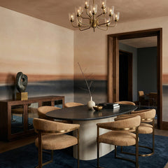 Rotko Dawn wallpaper mural shown in dining room with round table and boucle chairs