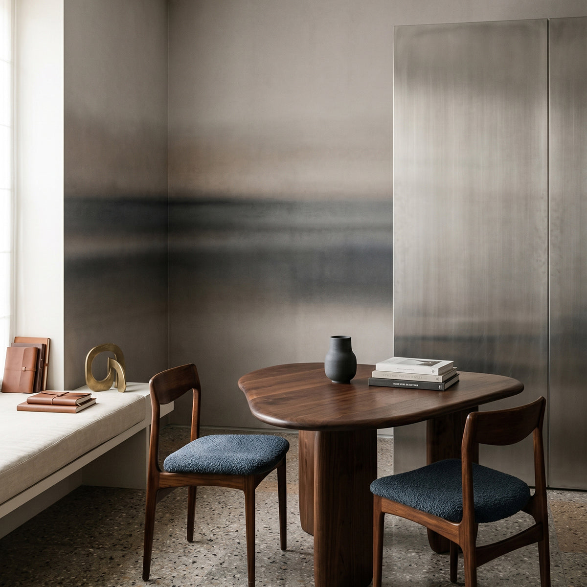 Rotko Sand wallpaper mural shown in dining room with round table and blue chairs