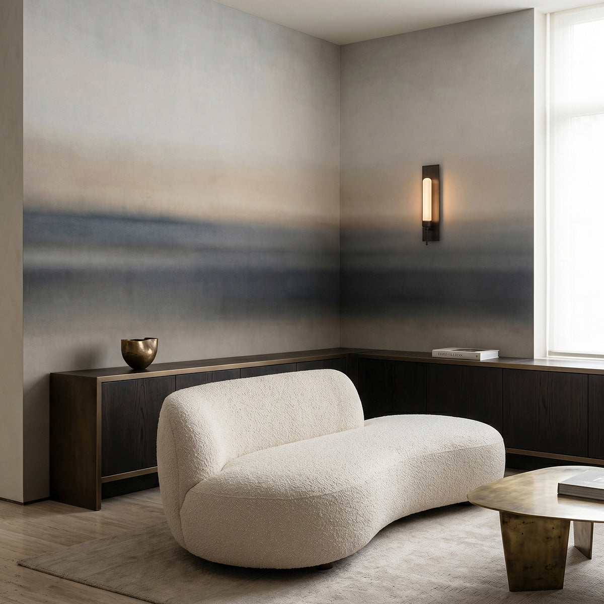 Rotko Sand wallpaper mural shown in living room with curved white sofa