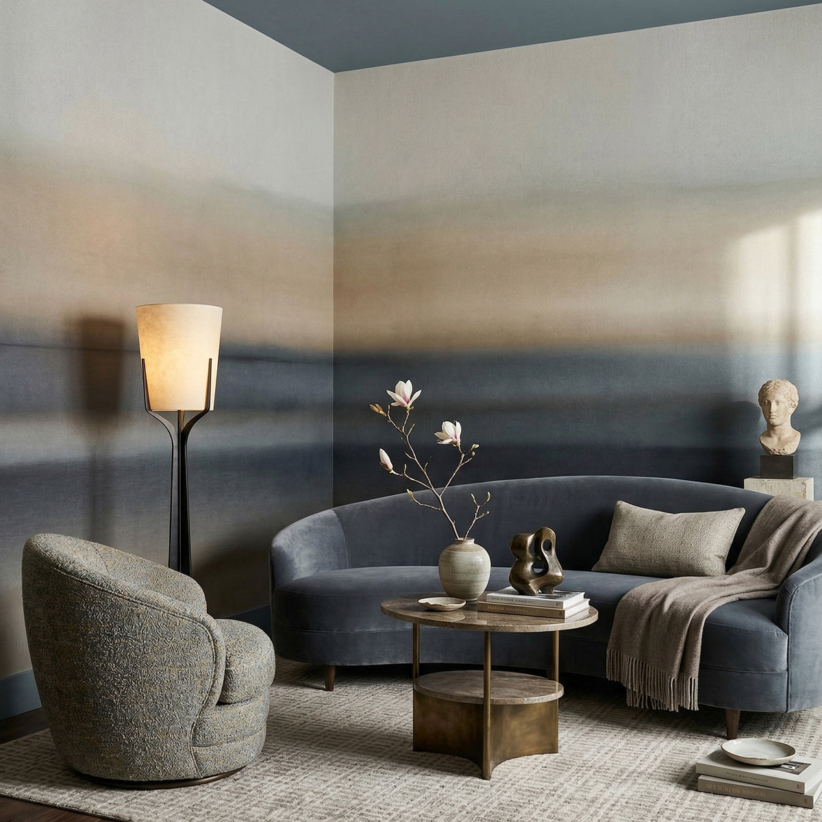 Rotko Sand wallpaper mural shown in living room with grey sofa and grey armchair