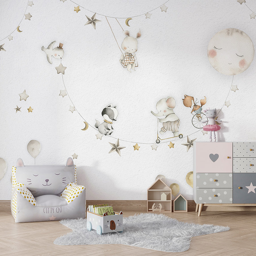 Sleeping Moon wallpaper mural shown in a children's bedroom armchair