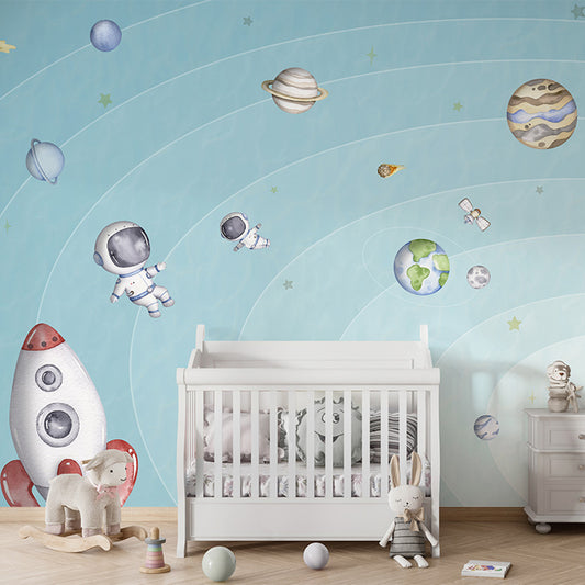 Space Joy – Light wallpaper mural shown in a children's nursery crib