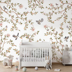 Summer Roses wallpaper mural in a nursery cot