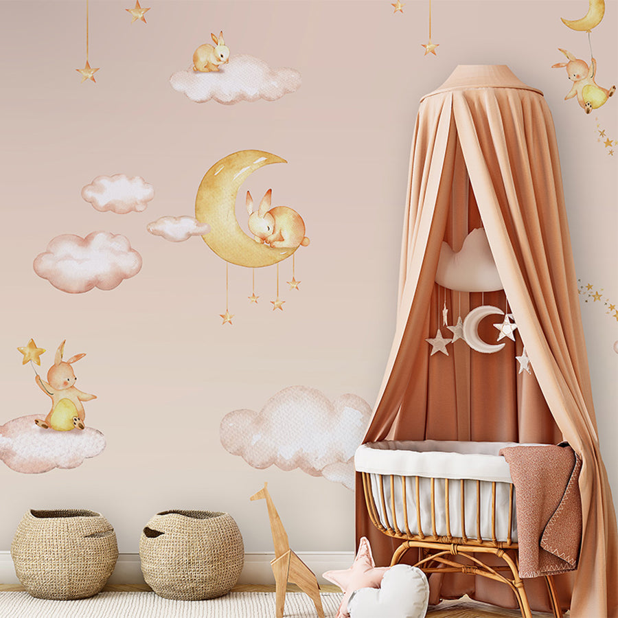 Sweet Dreams – Pink wallpaper mural shown in a children's nursery canopy crib