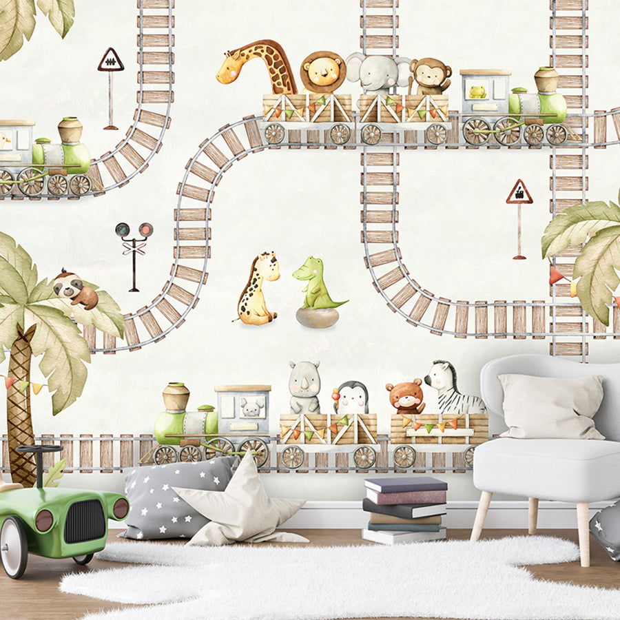 Train Travels wallpaper mural shown in a children's bedroom toy car