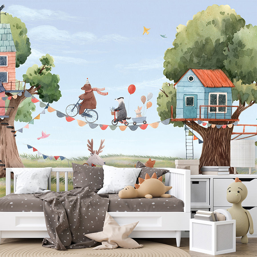 Treehouse Party wallpaper mural shown in a children's bedroom sofa