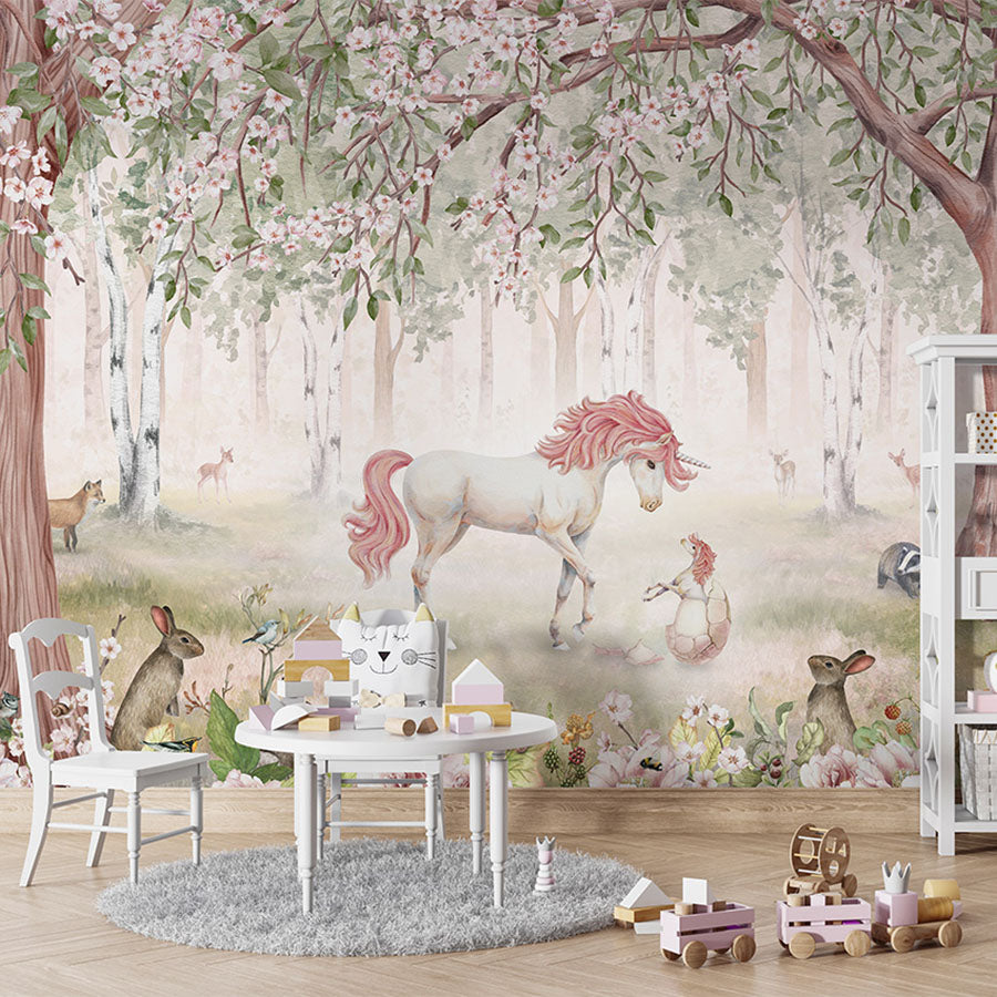 Unicorn Forest – Green wallpaper mural in a children’s playroom table chairs