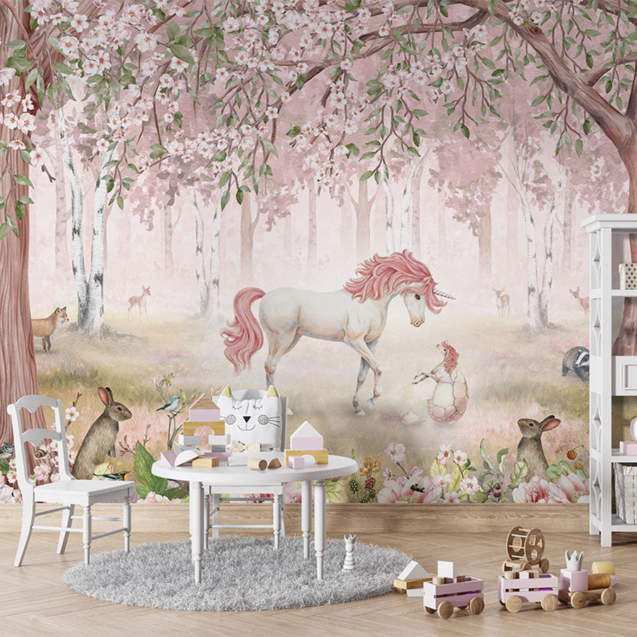 Unicorn Forest – Pink wallpaper mural in a children’s playroom table chairs
