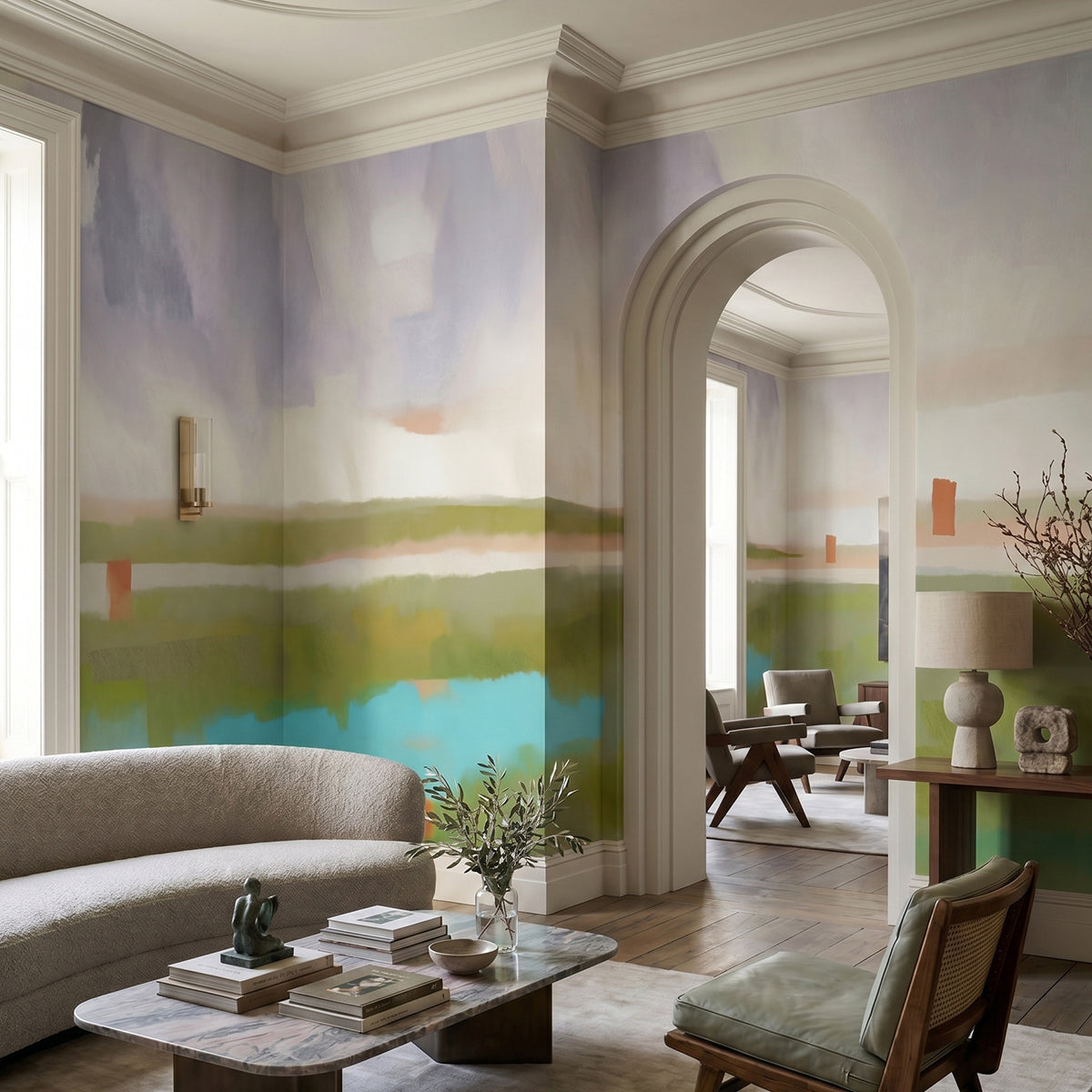 Velvet Dawn wallpaper mural shown in living room with curved sofa and wood chair