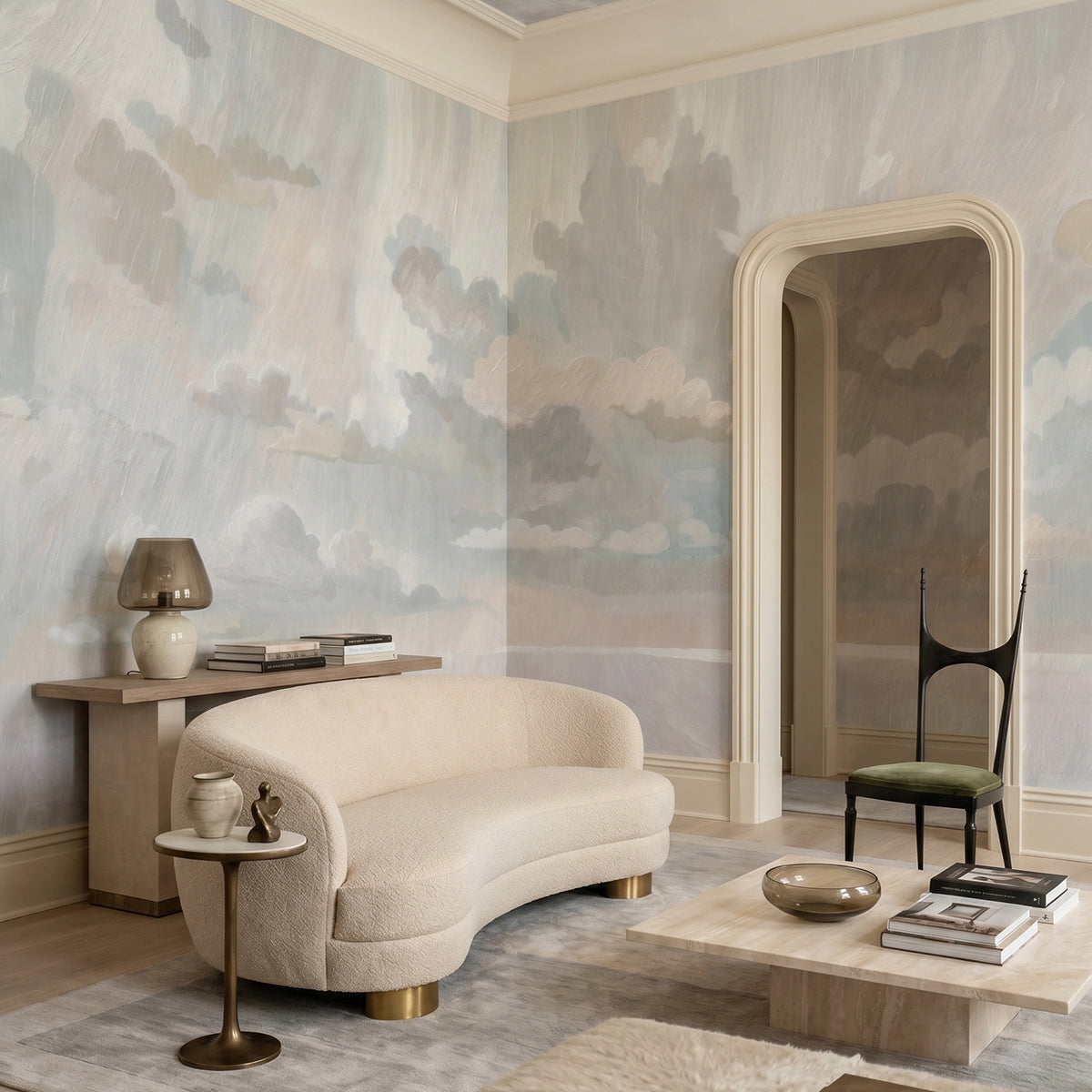 Velvet Smoke wallpaper mural shown in living room with curved sofa and arched doorway