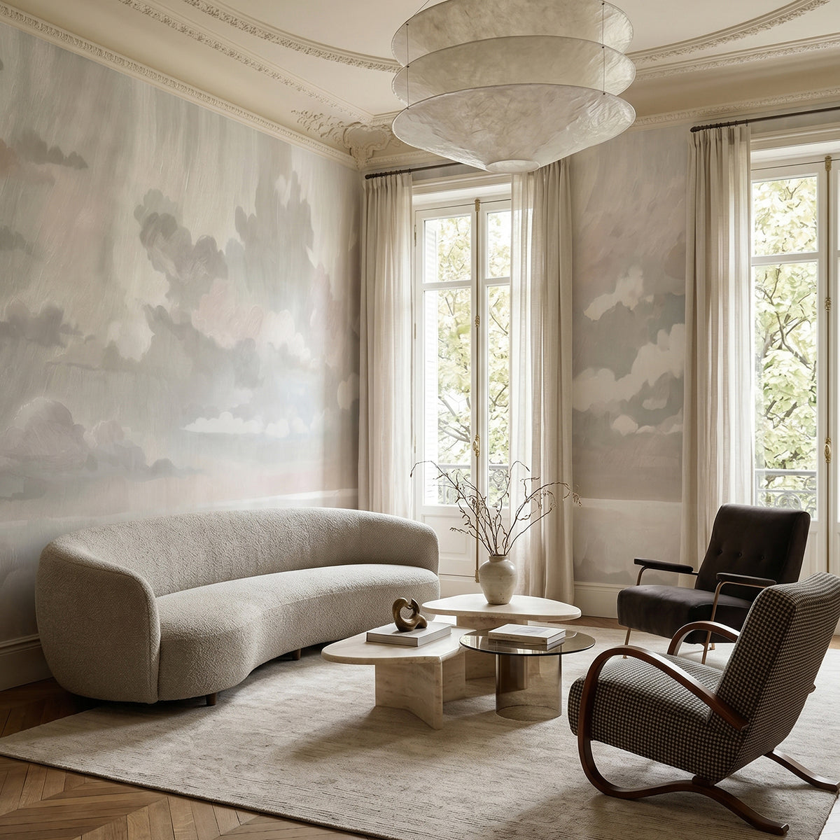 Velvet Smoke wallpaper mural shown in living room with curved sofa and rocking chair