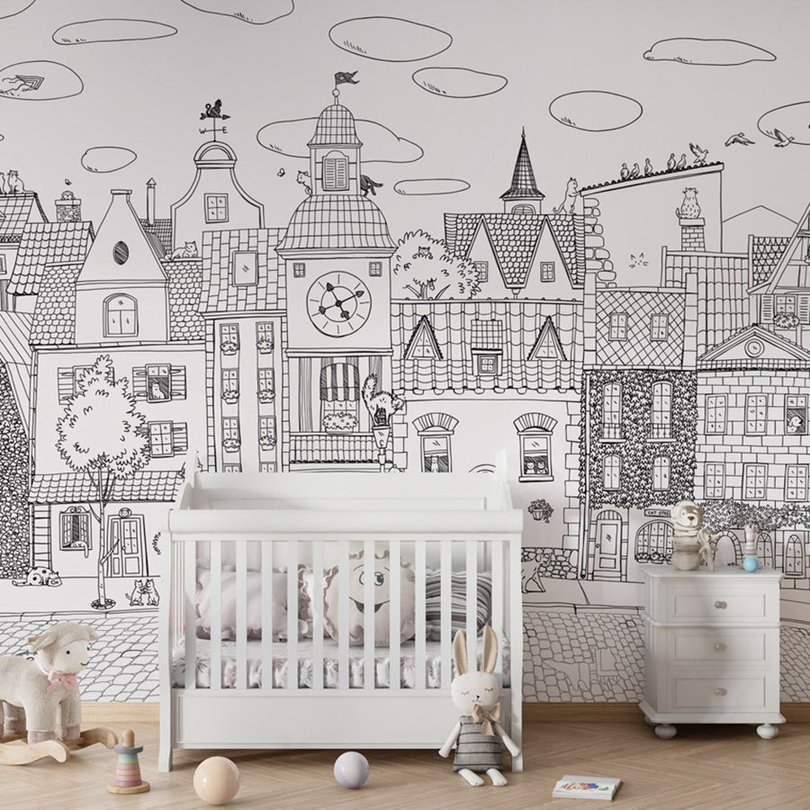 Village Cats – Black Lines wallpaper mural shown in a children's nursery crib