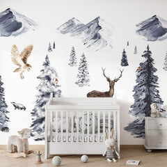 Winter Wonderland wallpaper mural in a nursery cot