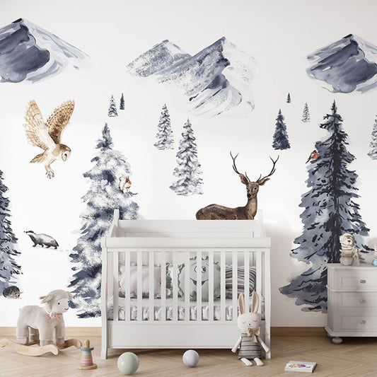 Winter Wonderland wallpaper mural in a nursery cot