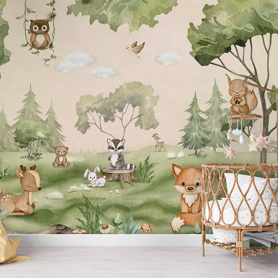 Woodland Joy wallpaper mural shown in a children's nursery crib